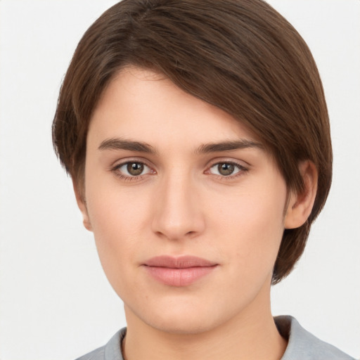 Neutral white young-adult female with short  brown hair and brown eyes