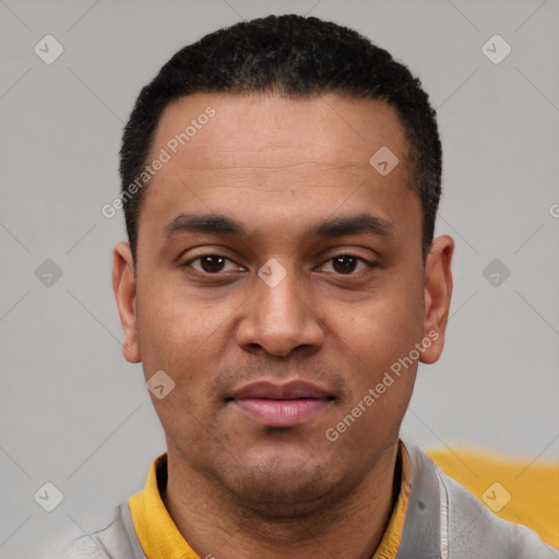 Joyful latino young-adult male with short  black hair and brown eyes