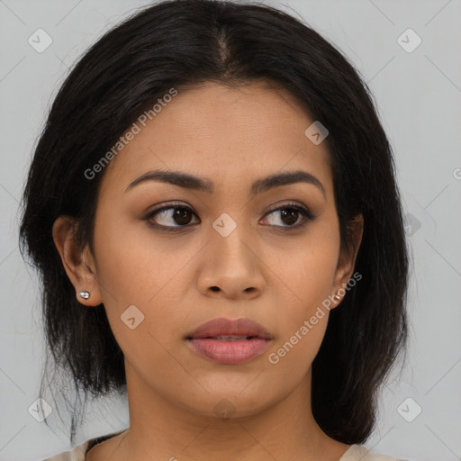 Joyful asian young-adult female with medium  black hair and brown eyes