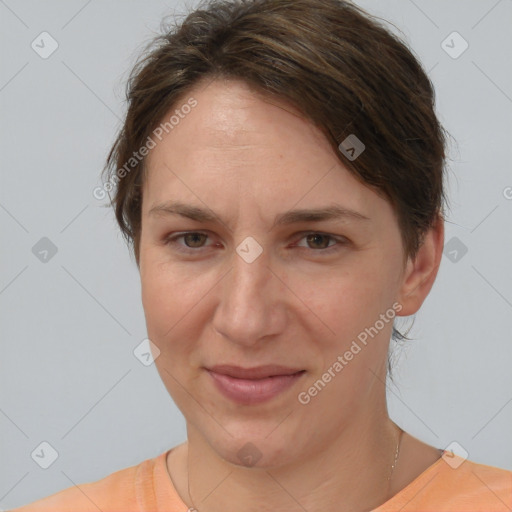 Joyful white adult female with medium  brown hair and brown eyes