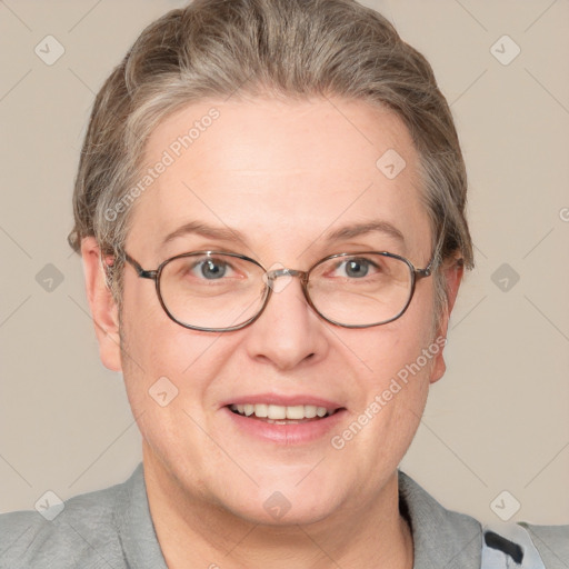 Joyful white adult female with short  brown hair and grey eyes