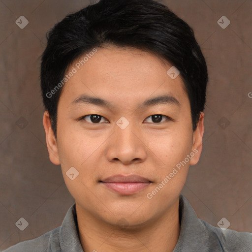 Joyful asian young-adult male with short  black hair and brown eyes