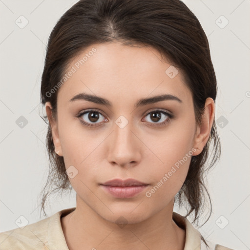 Neutral white young-adult female with medium  brown hair and brown eyes