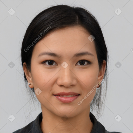 Joyful white young-adult female with medium  black hair and brown eyes