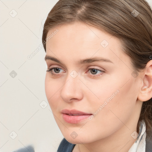 Neutral white young-adult female with medium  brown hair and grey eyes