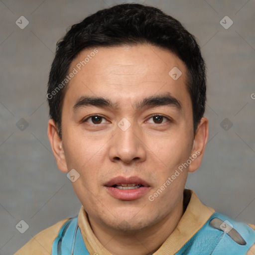 Joyful white young-adult male with short  black hair and brown eyes