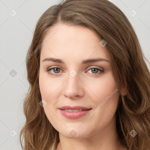 Joyful white young-adult female with long  brown hair and green eyes