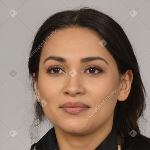 Joyful latino young-adult female with medium  brown hair and brown eyes