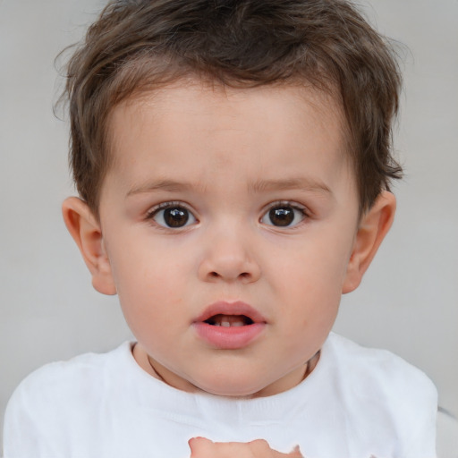 Neutral white child male with short  brown hair and brown eyes