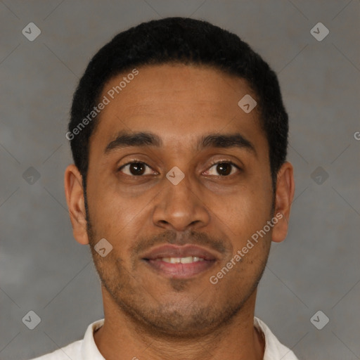 Joyful latino young-adult male with short  black hair and brown eyes