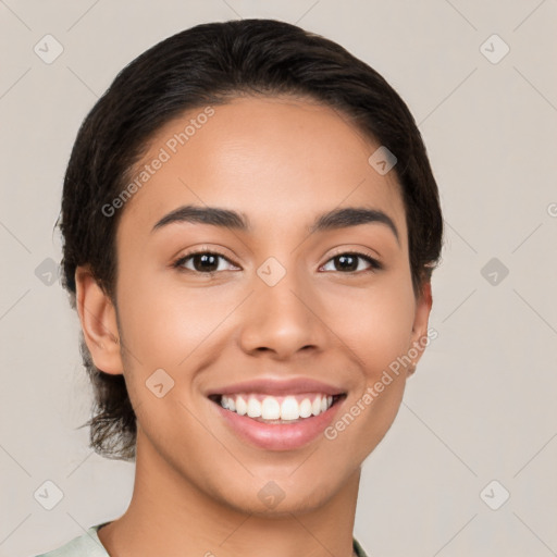 Joyful latino young-adult female with short  brown hair and brown eyes