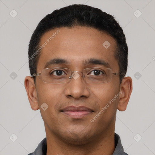 Joyful latino young-adult male with short  black hair and brown eyes