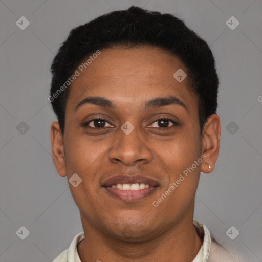 Joyful black young-adult female with short  black hair and brown eyes