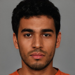 Neutral latino young-adult male with short  brown hair and brown eyes