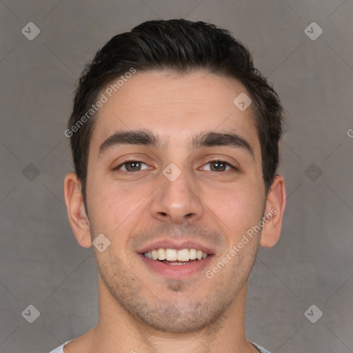 Joyful white young-adult male with short  brown hair and brown eyes