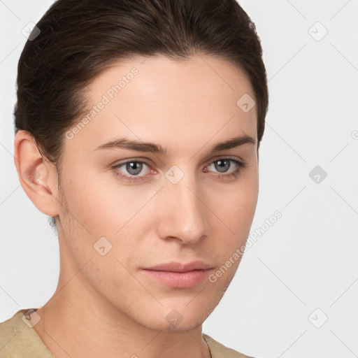 Neutral white young-adult female with short  brown hair and brown eyes