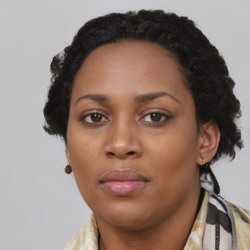 Neutral black young-adult female with medium  black hair and brown eyes