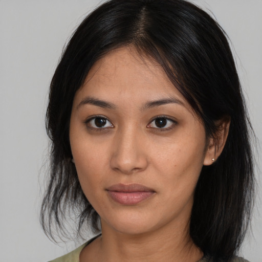 Neutral asian young-adult female with medium  brown hair and brown eyes