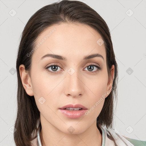 Neutral white young-adult female with medium  brown hair and grey eyes