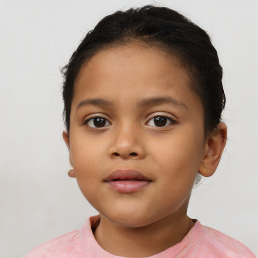 Neutral latino child female with short  brown hair and brown eyes