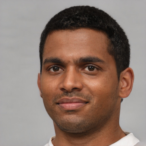 Neutral black young-adult male with short  black hair and brown eyes