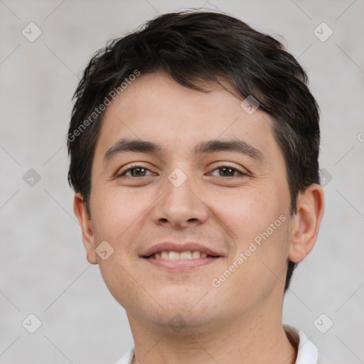 Joyful white young-adult male with short  brown hair and brown eyes