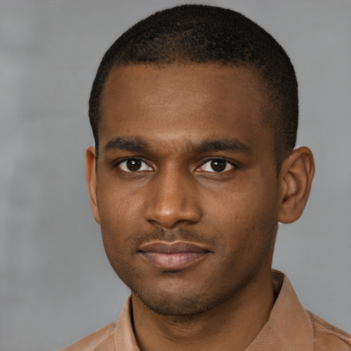 Neutral latino young-adult male with short  brown hair and brown eyes