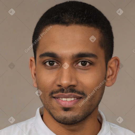 Joyful black young-adult male with short  black hair and brown eyes