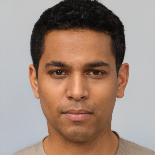Neutral latino young-adult male with short  black hair and brown eyes