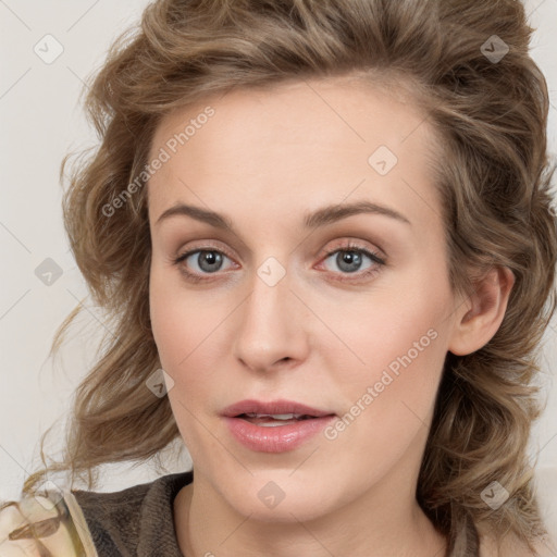 Joyful white young-adult female with medium  brown hair and blue eyes