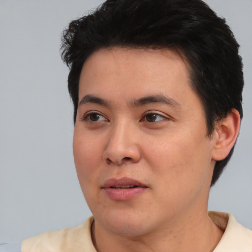 Neutral white young-adult male with short  black hair and brown eyes