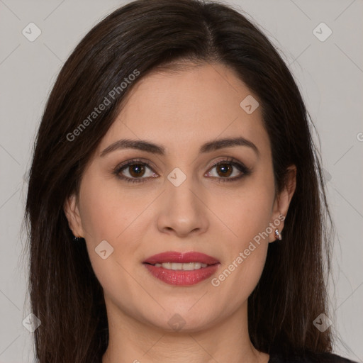 Joyful white young-adult female with long  brown hair and brown eyes