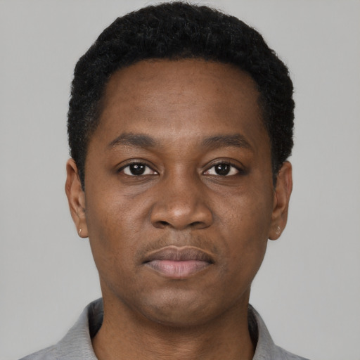 Neutral black young-adult male with short  black hair and brown eyes