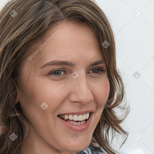 Joyful white adult female with long  brown hair and brown eyes