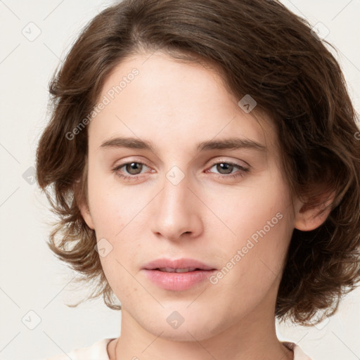 Neutral white young-adult female with medium  brown hair and brown eyes