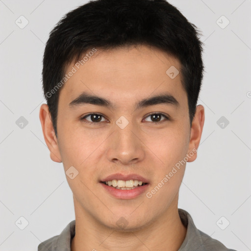 Joyful white young-adult male with short  black hair and brown eyes