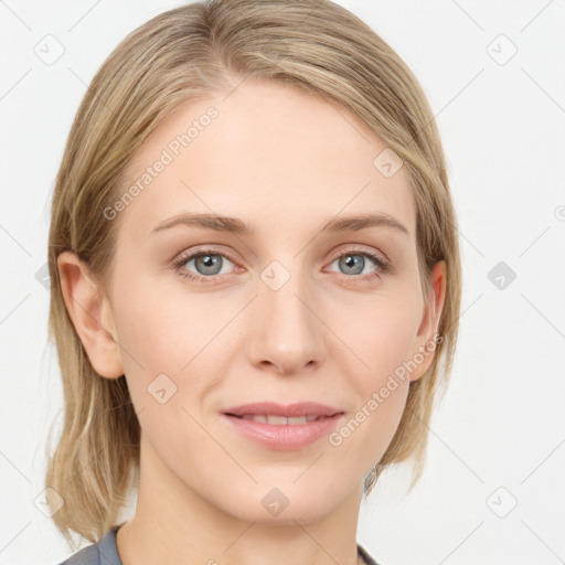 Joyful white young-adult female with medium  brown hair and blue eyes