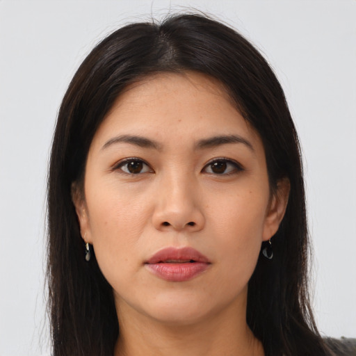 Neutral asian young-adult female with long  brown hair and brown eyes