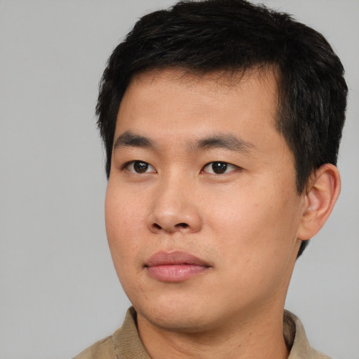 Neutral asian young-adult male with short  black hair and brown eyes