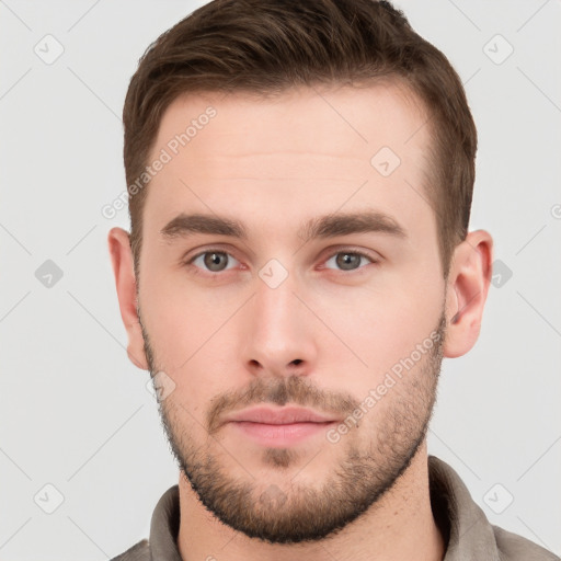 Neutral white young-adult male with short  brown hair and grey eyes