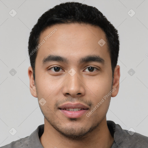 Neutral latino young-adult male with short  black hair and brown eyes