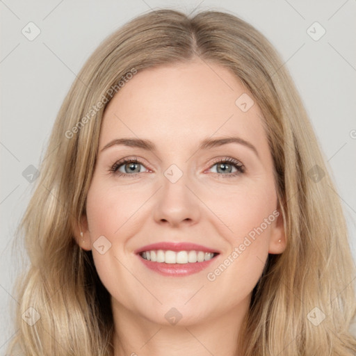 Joyful white young-adult female with long  brown hair and grey eyes