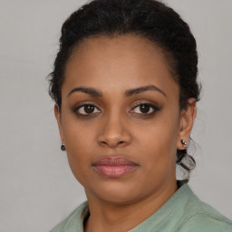 Neutral black young-adult female with short  brown hair and brown eyes