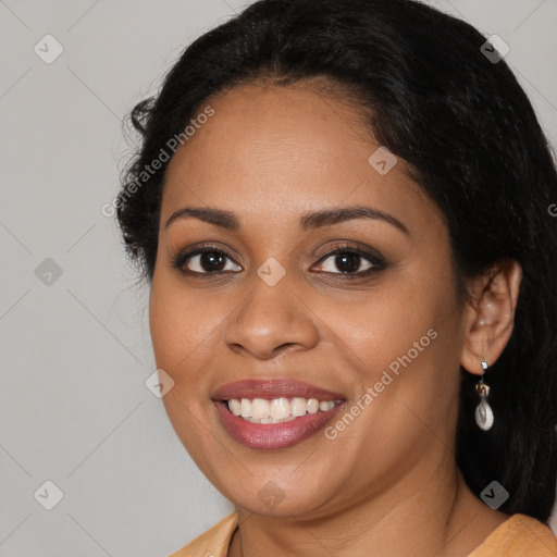 Joyful latino young-adult female with long  brown hair and brown eyes