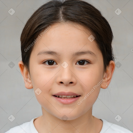 Joyful white child female with short  brown hair and brown eyes