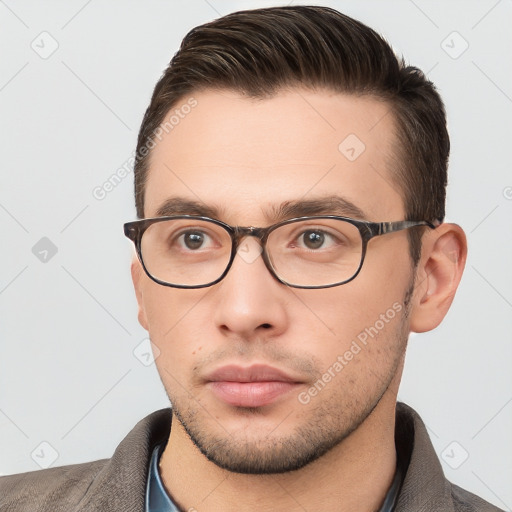 Neutral white young-adult male with short  brown hair and brown eyes