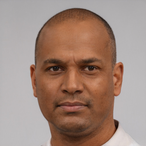 Neutral black adult male with short  brown hair and brown eyes