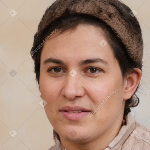 Joyful white adult female with short  brown hair and brown eyes