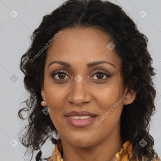 Joyful black young-adult female with long  brown hair and brown eyes
