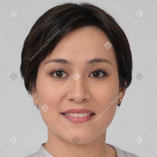 Joyful asian young-adult female with short  brown hair and brown eyes